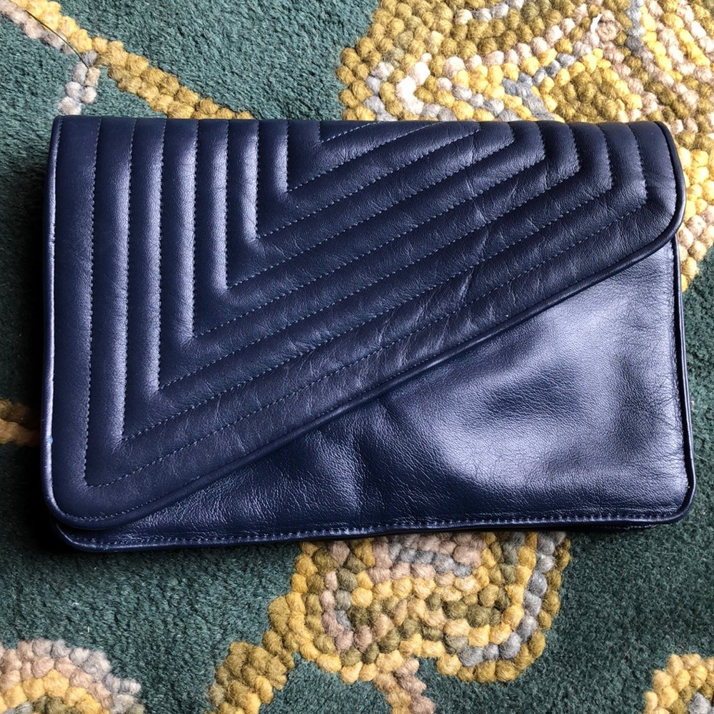 - Gorgeous navy leather clutch or shoulder bag